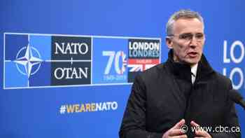 Leaders meeting at NATO summit after divisive day