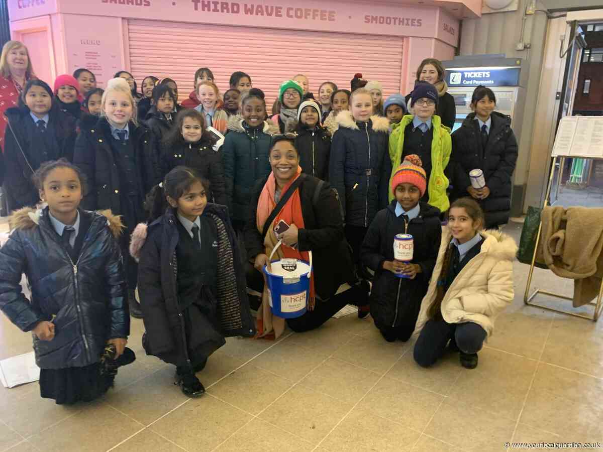 St Teresa’s RC Primary School pupils raise hundreds with station carols