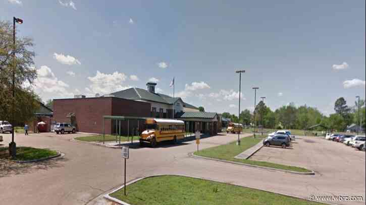 Louisiana police: Man shot into school, hid inside for hours