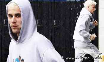 Justin Bieber braves the LA rain after apologizing for using the N-word as a teen