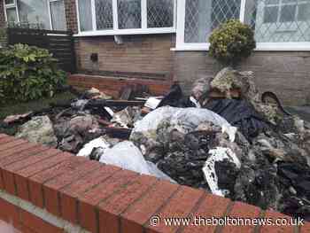 Loft fire in Farnworth bungalow causes residents to flee