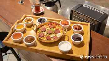 Turkish scrambled eggs from this downtown café are topped with feta and sausage