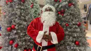 Black Santa comes to town at west Edmonton photo studio