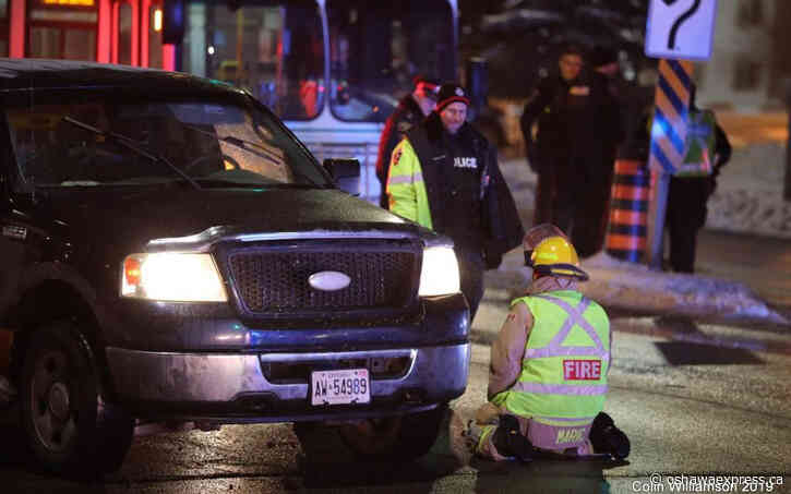 Oshawa man struck while lying on the road