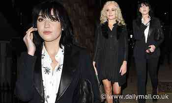 Daisy Lowe flashes her cleavage in a white floral shirt at VIP gin bash