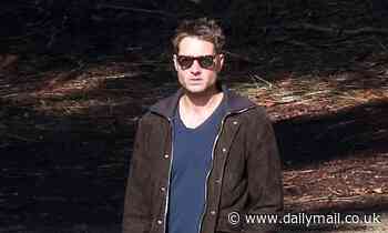 Justin Hartley seen without his wedding ring at photoshoot