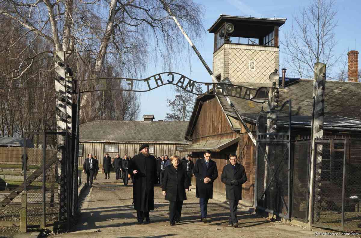 Angela Merkel makes her first visit to Auschwitz concentration camp
