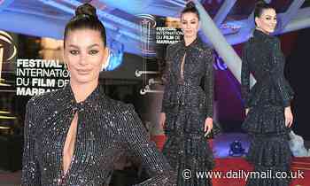 Camila Morrone dons a black sequinned ruffled gown during the Marrakech Film Festival