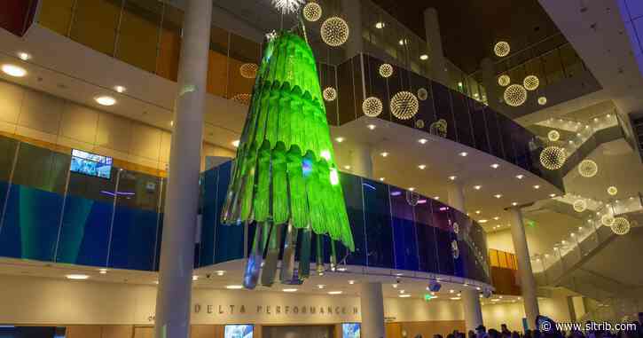 Eccles Theater’s Christmas tree is made up of 75 snowboards, math and imagination