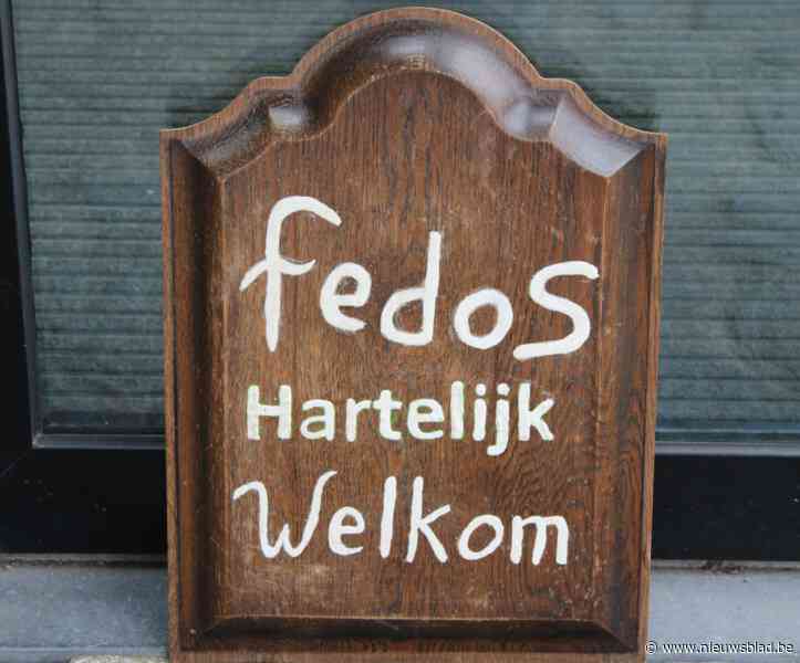 Foto. Kaartersclub Fedos in feeststemming