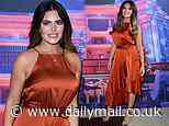 Megan Barton Hanson sizzles in a burnt orange satin dress at Emma Bunton's Christmas Party