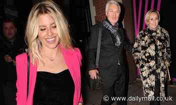 Mollie King looks glamorous in a bright pink suit as she leaves It Takes Two filming