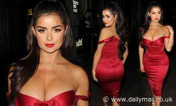 Demi Rose sets pulses racing in a plunging crimson gown at Christmas bash