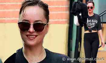 Dakota Johnson flashes her toned figure and a big smile after her morning sweat session