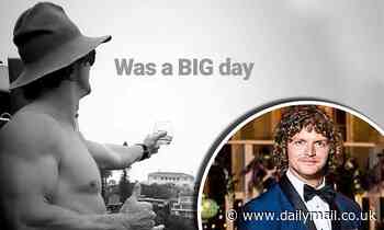 Nick 'Honey Badger' Cummins shows off his bulging biceps going shirtless
