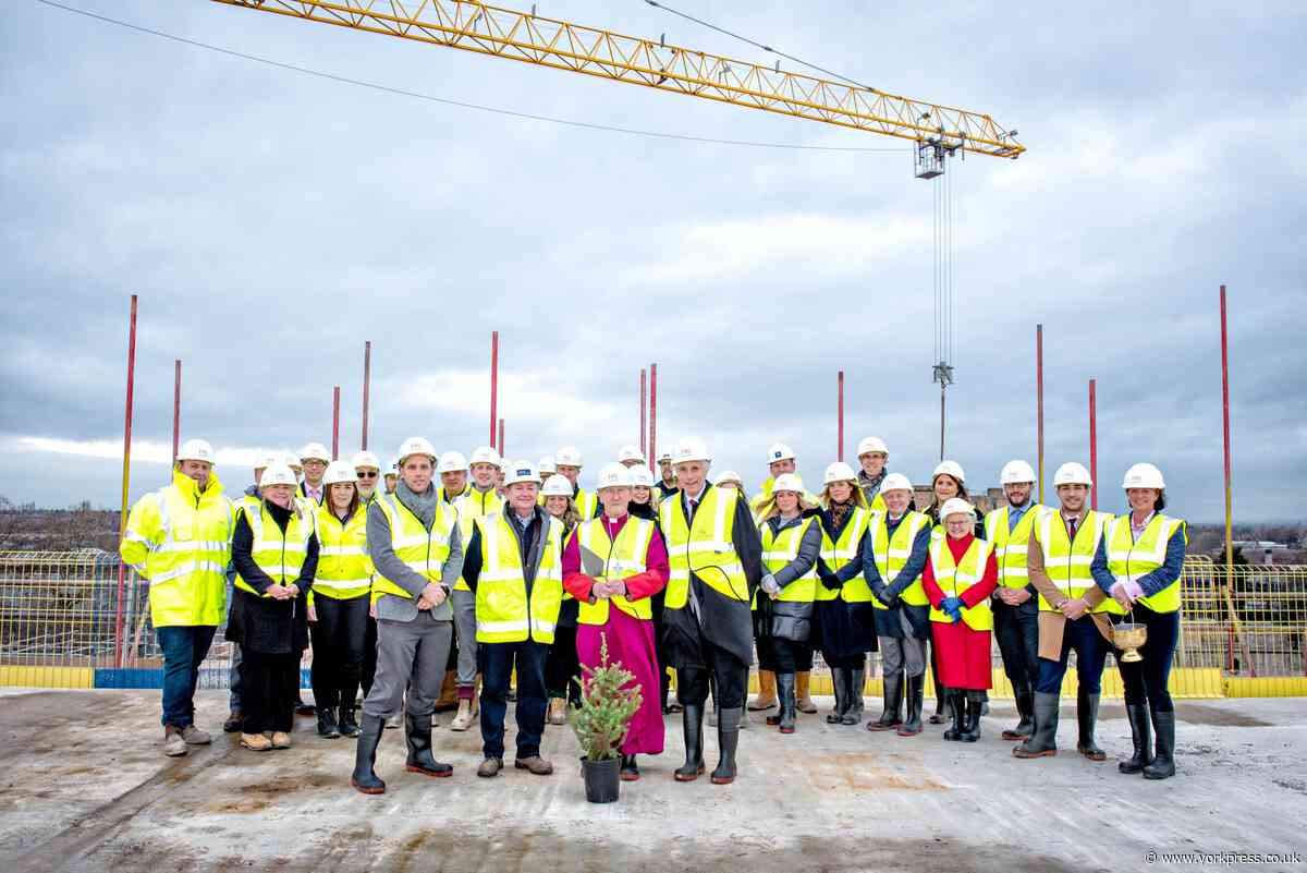 Roof-top ceremony marks 'iconic' Hudson Quarter development