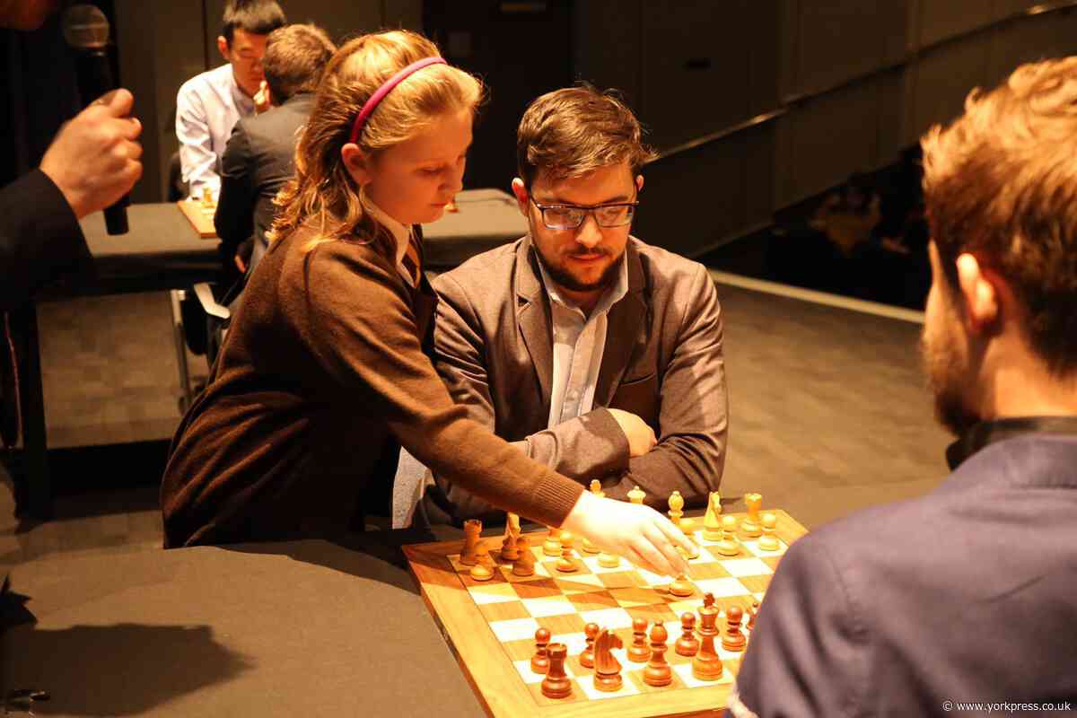 Budding York player meets world chess champion - and makes first move