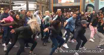 Why a flash mob appeared in Newcastle as dancers and singers stop crowds at the Monument