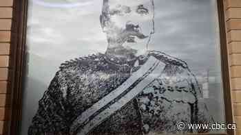 B.C. cannabis shop covers window with photo of frontier Mountie. RCMP wants it removed