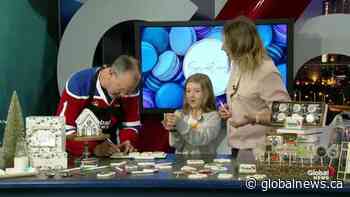 Family cookie decorating with Sweetness Bakery