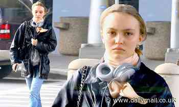 Lily-Rose Depp rocks chic airport ensemble as she jets into New York from her hometown in Paris