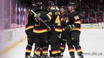 J.T. Miller scores OT winner as Canucks edge Sabres