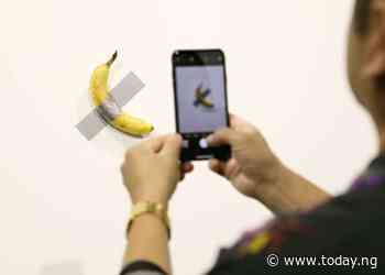 Man eats $120,000 piece of art – a banana taped to wall
