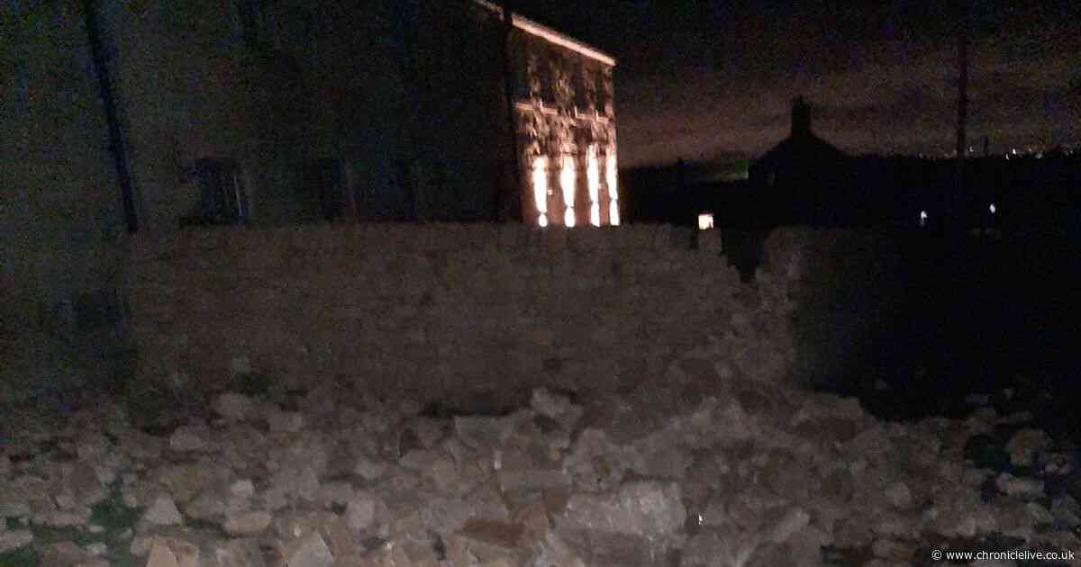 Car crashes into stone wall and flips onto roof after coming off Military Road in Northumberland