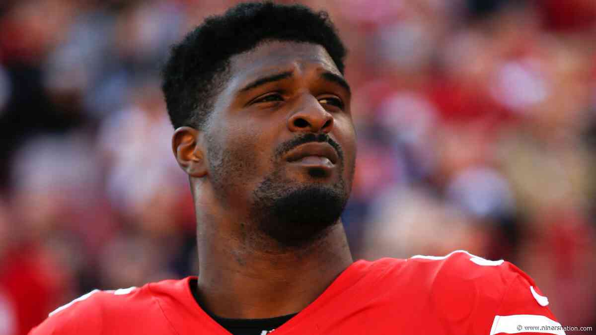 Dee Ford on sidelines