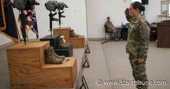 Guard members honor fallen with mournful roll call