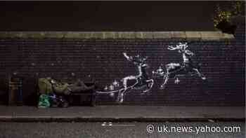 New Banksy mural features homeless man on bench