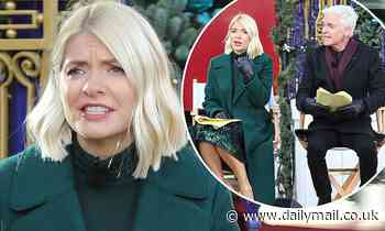 Holly and Phil 'feud': Body language expert claims blonde has adopted a 'more dominant role'