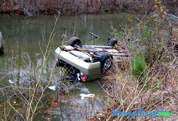 Car Submerged in Lake After MVA Rollover