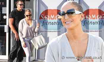 Jennifer Lopez is beaming as she heads to the gym alongside fiancé Alex Rodriguez