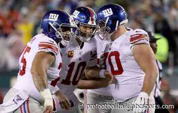 Eli Manning throws for 179 yards, two TDs in first half against lackluster Eagles