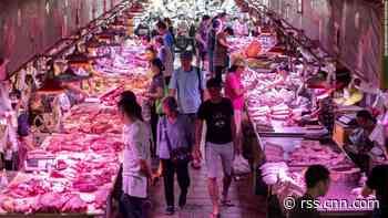 Asian markets mixed after soaring pork prices push China's inflation rate to eight-year high