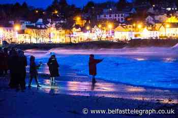 Pictured: Deirdre McShane's friends and family hold emotional dawn vigil at Ballycastle water's edge