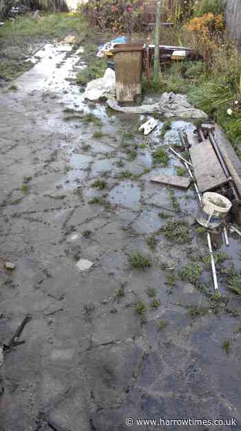 Harrow garden overflowing with sewage and waste