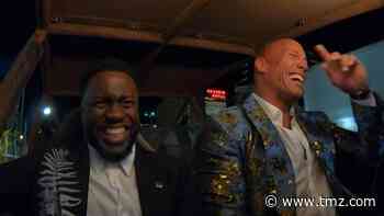 The Rock, Kevin Hart Ride Dune Buggies to 'Jumanji' Premiere