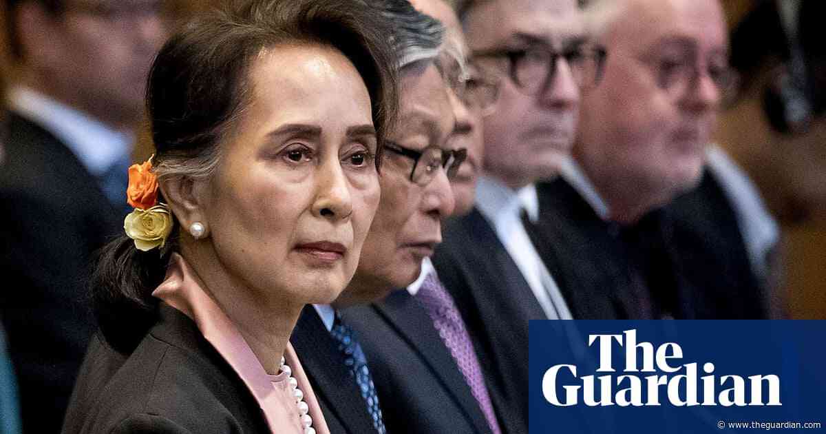 Aung San Suu Kyi impassive as genocide hearing begins