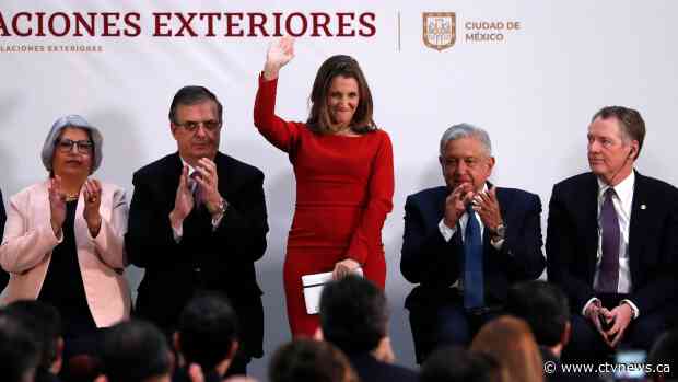 Canada signs on to updated new NAFTA deal in Mexico