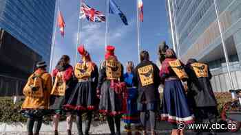 First Nations youth protest proposed massive oilsands mine at UN climate conference