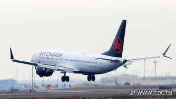 Transport minister urges Air Canada to resolve system woes ahead of holiday travel