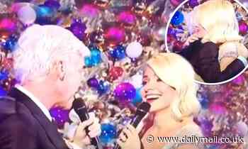 Holly Willoughby shrugs off Phillip Schofield 'feud' claims as she shares video of the two singing