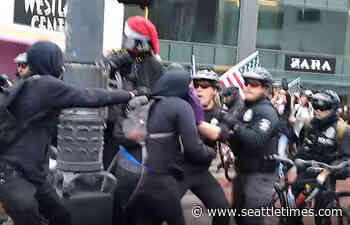 Seattle police open preliminary investigation into viral video of clash between officers and anti-Trump protesters