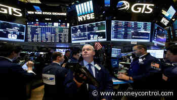 Dow hit by losses in Boeing, Home Depot; SP 500, Nasdaq edge higher