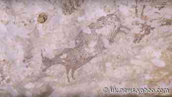 Earliest known hunting scene uncovered in cave painting
