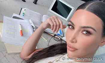 Kim Kardashian is a far cry from the traditional law student as she hits the books in full glam mode