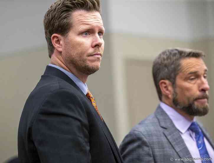 Arizona official in human smuggling case seeks to keep seat