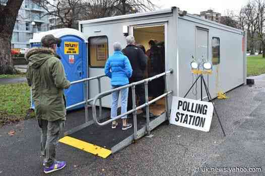 Long queues reported at polling stations as voters turn out for 'election of a lifetime'